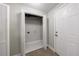 Basement area with a walk-in closet and neutral carpet at 5287 Chantilly Ter, Atlanta, GA 30349