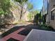 Backyard featuring mulch landscaping and a brick patio at 595 Broadview Ne Pl, Atlanta, GA 30324