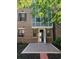 View of the backyard patio and landscaping with brick accents at 595 Broadview Ne Pl, Atlanta, GA 30324