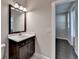 Bathroom featuring a single sink vanity and hardwood floors at 595 Broadview Ne Pl, Atlanta, GA 30324