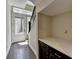 Foyer space with hardwood floors and a built-in countertop area, illuminated by natural light at 595 Broadview Ne Pl, Atlanta, GA 30324