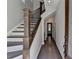 Inviting entryway featuring hardwood floors, staircase with decorative iron railing, and neutral paint at 595 Broadview Ne Pl, Atlanta, GA 30324