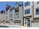 Charming townhouse with brick and siding, showcasing a front-entry garage and balcony at 595 Broadview Ne Pl, Atlanta, GA 30324