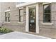 Exterior of a brick building with an inviting doorway and stone trim at 595 Broadview Ne Pl, Atlanta, GA 30324