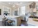 Open-concept kitchen with a large island, stainless steel appliances, and a view into the adjacent room at 595 Broadview Ne Pl, Atlanta, GA 30324