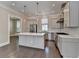 Gourmet kitchen featuring stainless appliances, granite countertops, kitchen island and open floor plan at 595 Broadview Ne Pl, Atlanta, GA 30324
