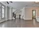 Open concept living room features hardwood floors, French doors, and neutral paint at 595 Broadview Ne Pl, Atlanta, GA 30324
