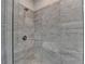Shower area with glass enclosure and tile walls at 595 Broadview Ne Pl, Atlanta, GA 30324