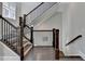A staircase with dark hardwood and white trim at 595 Broadview Ne Pl, Atlanta, GA 30324
