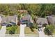 Aerial shot of a two-story home, manicured lawn, long driveway, and neighborhood setting at 68 Highcrest Dr, Acworth, GA 30101