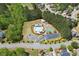 Aerial view of community amenities including a pool, playground, sports court and ample parking at 68 Highcrest Dr, Acworth, GA 30101