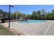 Large community pool area with shade, a smaller pool, and ample seating space at 68 Highcrest Dr, Acworth, GA 30101