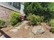 Serene garden with stepping stones and mature plantings at 68 Highcrest Dr, Acworth, GA 30101