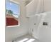 Laundry room with white tile floors and white cabinets at 68 Highcrest Dr, Acworth, GA 30101