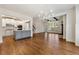 Living room features hardwood floors and open concept layout to the kitchen at 68 Highcrest Dr, Acworth, GA 30101