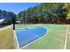 Community sports court with basketball hoops and ample space for active play at 68 Highcrest Dr, Acworth, GA 30101