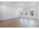 Bright and open living room with hardwood floors and natural lighting at 876 Bramlett Shoals Rd, Lawrenceville, GA 30045