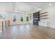 Upstairs living room with fireplace and many windows at 876 Bramlett Shoals Rd, Lawrenceville, GA 30045
