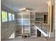 Upper-level view overlooking a room with custom trim, tall windows, and an airy atmosphere at 876 Bramlett Shoals Rd, Lawrenceville, GA 30045