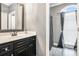 Bathroom features a modern vanity with a white countertop and updated fixtures at 1837 Miramonte Way, Lawrenceville, GA 30045