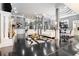 Expansive living room featuring elegant columns, a modern chandelier, and stylish decor for luxurious living at 1837 Miramonte Way, Lawrenceville, GA 30045