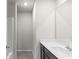 Stylish bathroom featuring a modern sink, mirror, and shower stall at 3728 In Bloom Way, Auburn, GA 30011