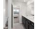 Bathroom featuring a gray tile floor, gray walls, and double sink vanity at 3728 In Bloom Way, Auburn, GA 30011