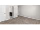 Bedroom featuring neutral carpet, white doors, and gray walls at 3728 In Bloom Way, Auburn, GA 30011