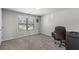 Well-lit office space with natural light and comfortable carpet flooring at 3728 In Bloom Way, Auburn, GA 30011