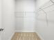 Walk-in closet with carpet and wire shelving, offering ample storage space at 1998 Shalimar Ne Dr, Atlanta, GA 30345