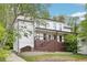 Stunning two-story home with a welcoming porch and well-maintained lawn, perfect for outdoor relaxation and entertainment at 1998 Shalimar Ne Dr, Atlanta, GA 30345