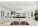 Open concept kitchen with marble countertops and pendant lighting offers a view of the living room at 1998 Shalimar Ne Dr, Atlanta, GA 30345