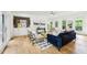 Open concept living room with hardwood floors, modern decor, and lots of natural light at 1998 Shalimar Ne Dr, Atlanta, GA 30345