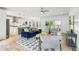 Open concept living space connecting the kitchen with a spacious living room, complete with modern furnishings at 1998 Shalimar Ne Dr, Atlanta, GA 30345