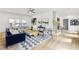 Bright living room with hardwood floors, modern decor, and a statement rug at 1998 Shalimar Ne Dr, Atlanta, GA 30345
