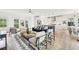 Open living space with combined living room, dining area, and modern kitchen with stainless steel appliances at 1998 Shalimar Ne Dr, Atlanta, GA 30345