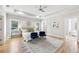 Luxurious primary bedroom with a tray ceiling, stylish decor, and an attached bathroom visible at 1998 Shalimar Ne Dr, Atlanta, GA 30345