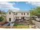 Spacious backyard featuring a large deck, lush greenery, and a charming wooden fence for added privacy and curb appeal at 1998 Shalimar Ne Dr, Atlanta, GA 30345