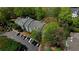 Aerial view of the condominiums with mature trees and ample parking at 211 Summit North Drive Ne, Atlanta, GA 30324