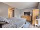 Comfortable bedroom featuring a king bed, modern television and soothing grey walls at 211 Summit North Drive Ne, Atlanta, GA 30324