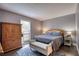 Comfortable bedroom with a cozy bed, wooden furniture, and ample natural light at 211 Summit North Drive Ne, Atlanta, GA 30324