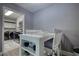 Bright dining area with a view into the kitchen and laundry area, ideal for casual meals at 211 Summit North Drive Ne, Atlanta, GA 30324