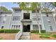 Three-story building with well-manicured landscaping and inviting entryway at 211 Summit North Drive Ne, Atlanta, GA 30324
