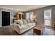 Comfortable living room featuring a cozy sofa and elegant furnishings at 211 Summit North Drive Ne, Atlanta, GA 30324