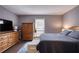 Inviting main bedroom with warm wood accents and comfortable furnishings, a relaxing retreat at 211 Summit North Drive Ne, Atlanta, GA 30324