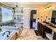 Bathroom featuring a glass enclosed shower and double sinks at 2319 Lochinver Ln, Conyers, GA 30094