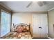 Comfortable bedroom with hardwood floors and a double door closet offers a restful retreat at 2319 Lochinver Ln, Conyers, GA 30094