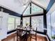 Charming breakfast nook filled with natural light, vaulted ceiling, and a modern ceiling fan at 2319 Lochinver Ln, Conyers, GA 30094