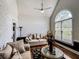 Bright and airy living room with vaulted ceilings and large arched window at 2319 Lochinver Ln, Conyers, GA 30094