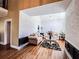 Open-concept living room with hardwood floors and plenty of natural light at 2319 Lochinver Ln, Conyers, GA 30094